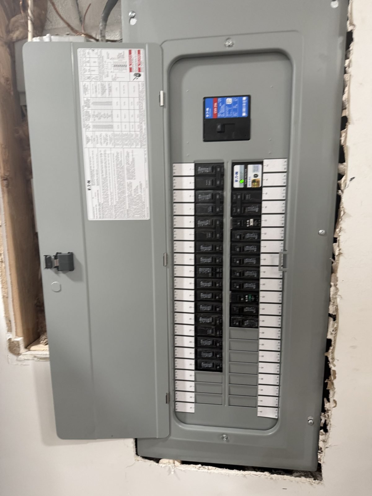 Electrical panel with neatly labeled circuit directory by S&H Contracting